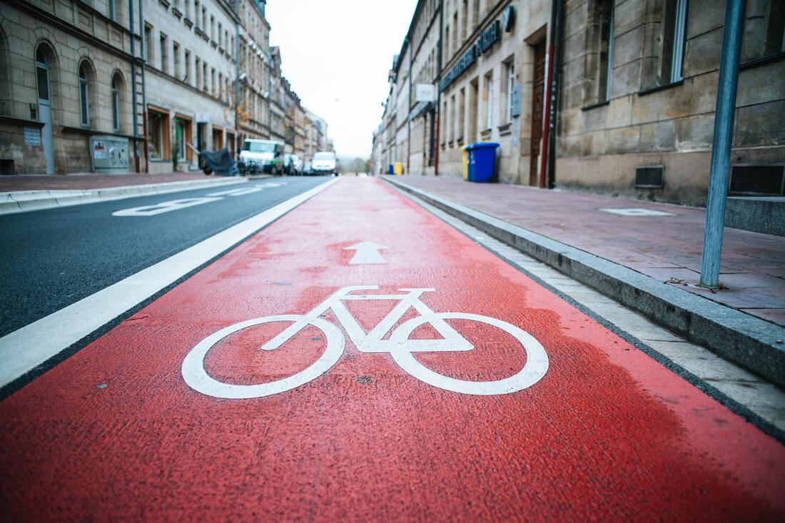 red and white bike lane marking